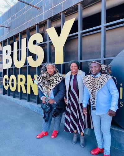With guests at Busy Corner — Community